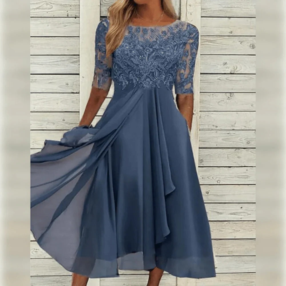 Elegant Midi Dress with Detail and Flowy Skirt for Festive Occasions
