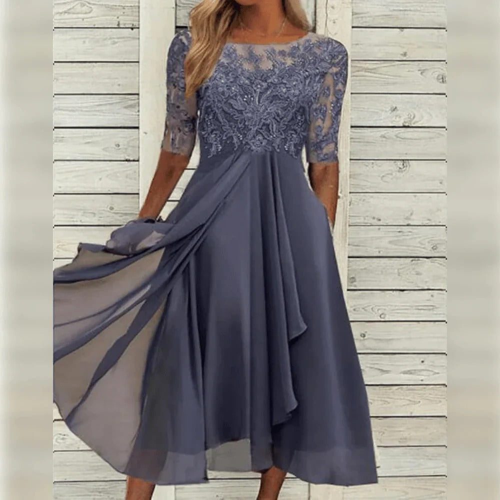 Elegant Midi Dress with Detail and Flowy Skirt for Festive Occasions